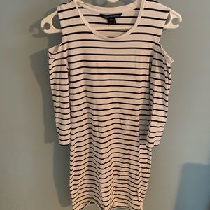 White and black fitted dress.